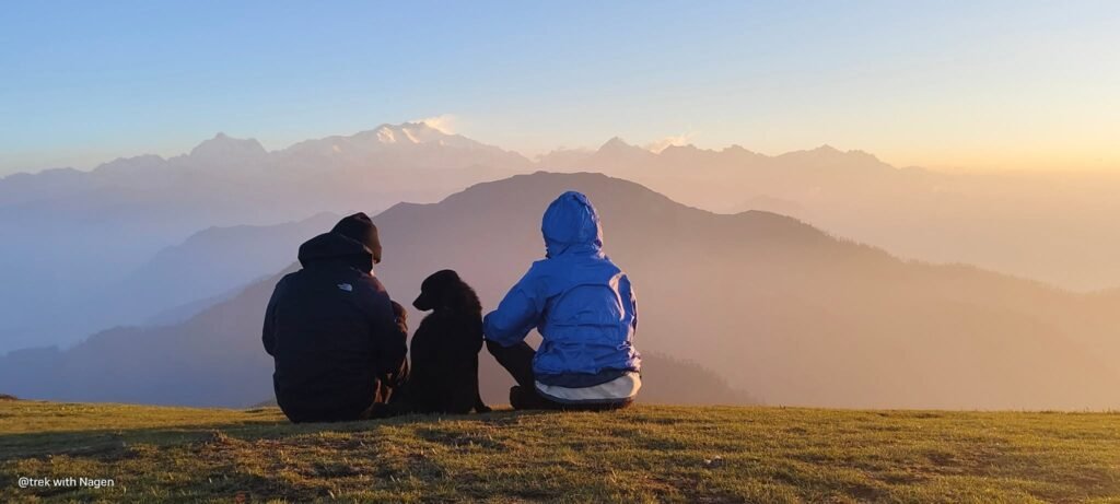 Trekker watching the Himalayan sunrise
