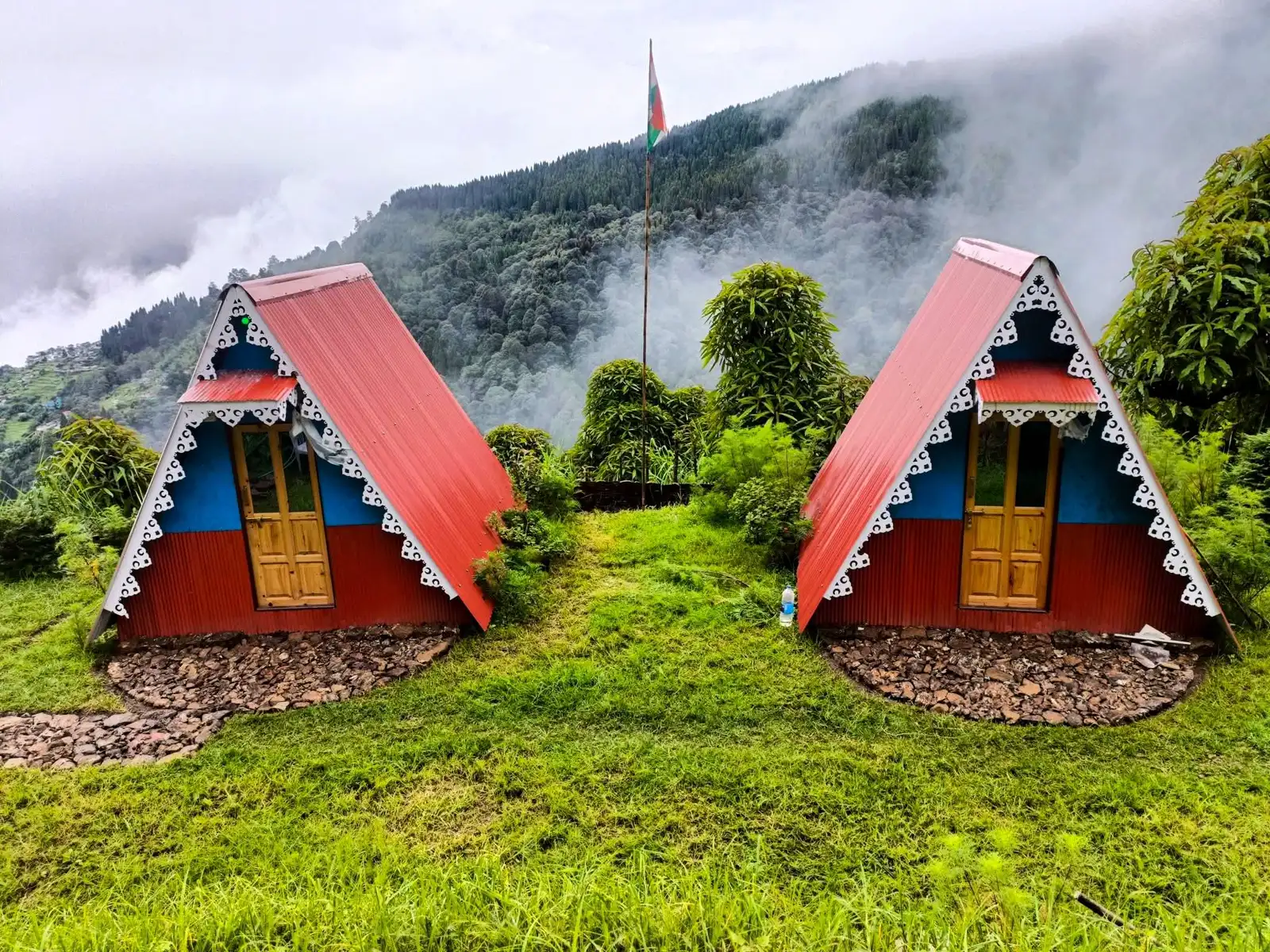 Gurdum homestay photos: A-frame cabins and mountain view at Gurdum Backpackers Homestay