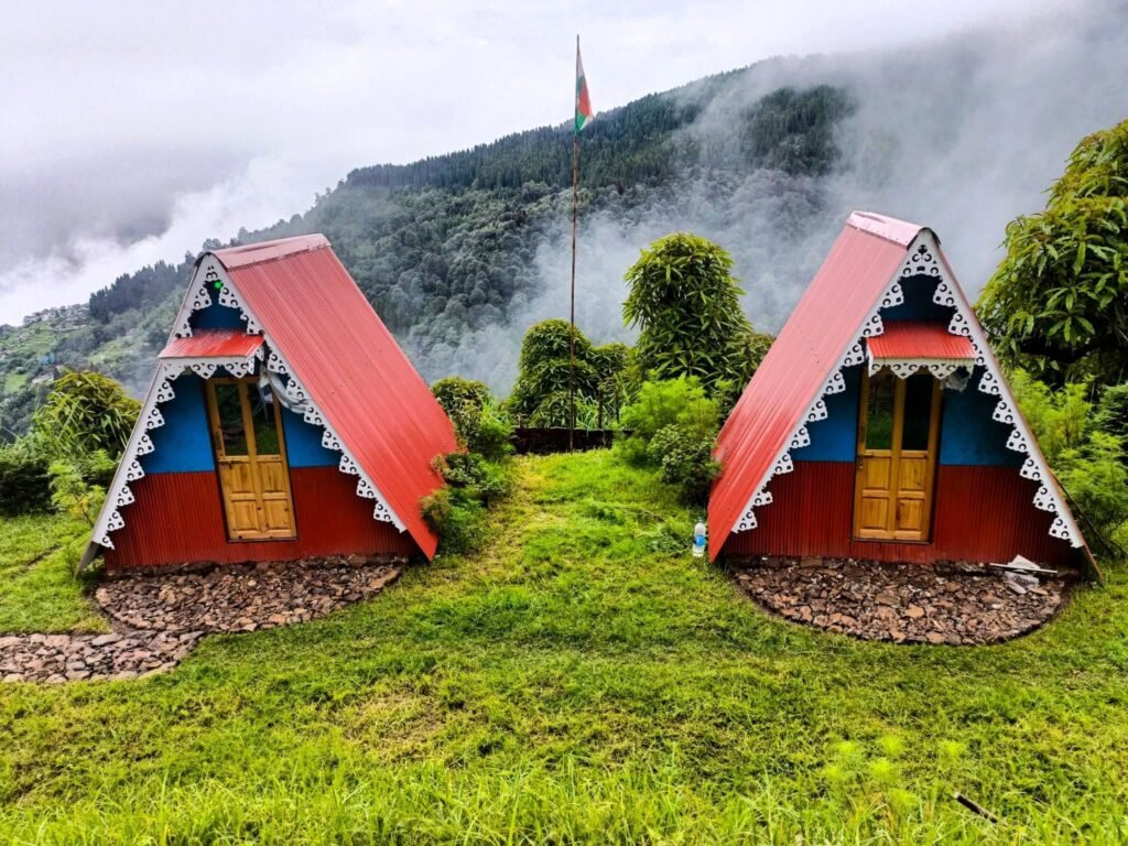 A-frame cabins at Gurdum Backpackers Homestay