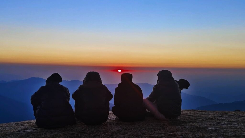 Sunrise silhouettes of trekkers