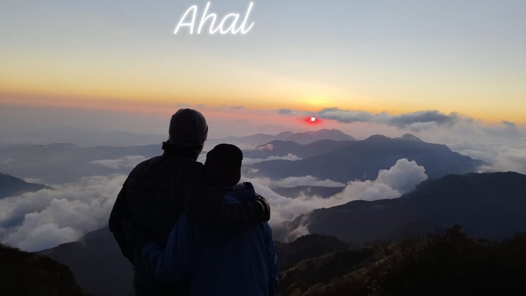 Sunrise over the mountains with trekkers