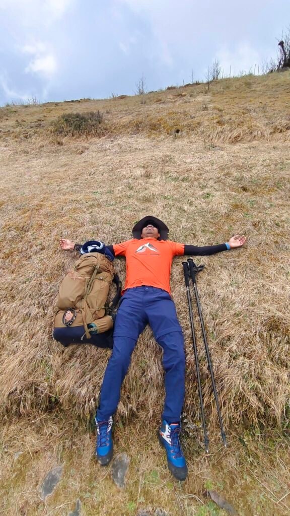 Hiker resting in the meadow
